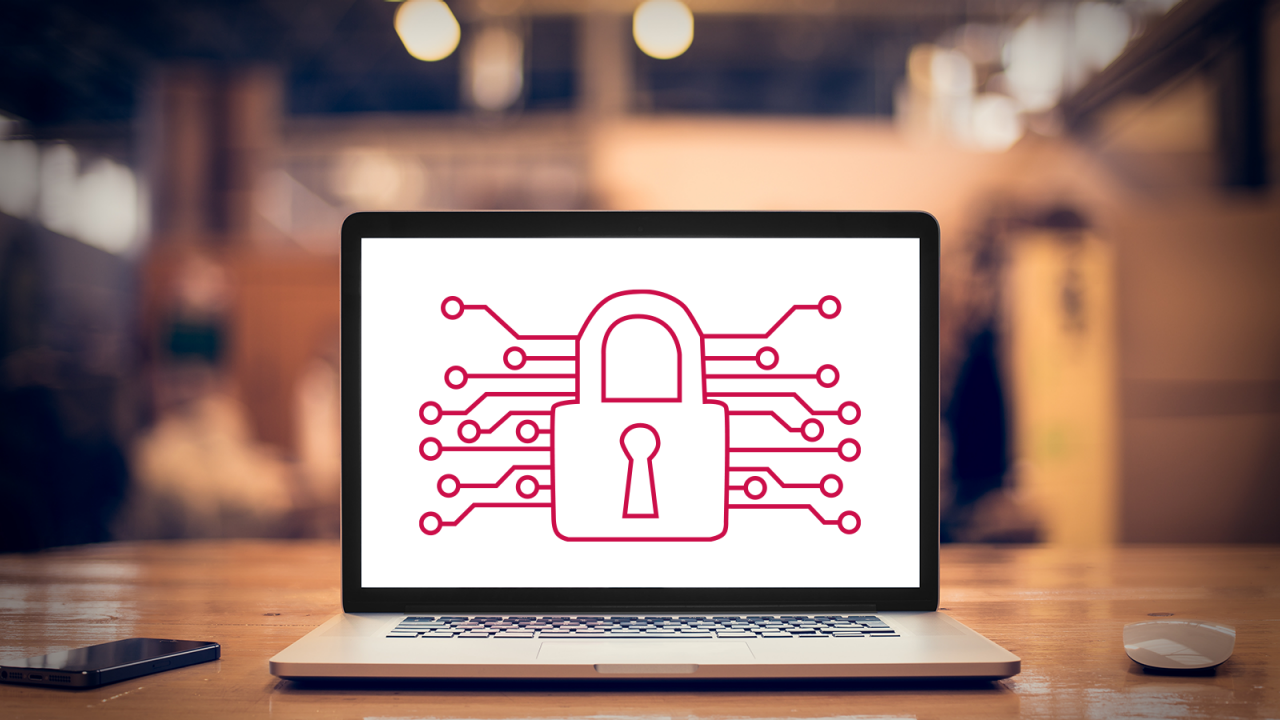 Laptop in a cafe displaying red, virtual lock for model security.